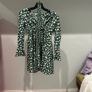 Green floral dress and comes with also green floral belt
